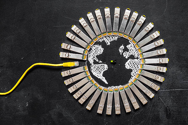 Concept of internet security/computer data encryption / data protection Internet SFP network modules  as the shape of Earth and RJ45 ethernet cable for communication and green diode on the black background.Concept of internet security/computer data encryption / data protection / security enhancement computer plan fiber optic engineer stock pictures, royalty-free photos & images