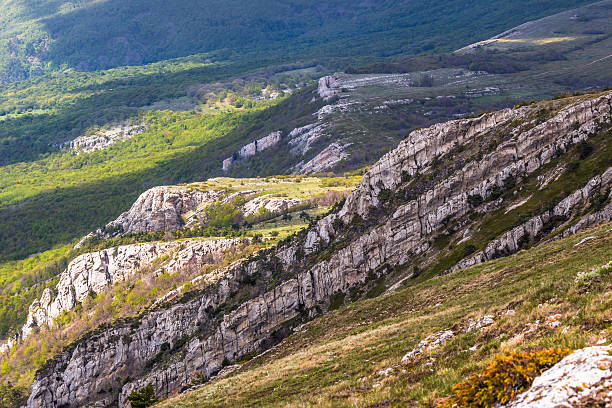 istock Vertical precipice on a slope of a mountain 592672970