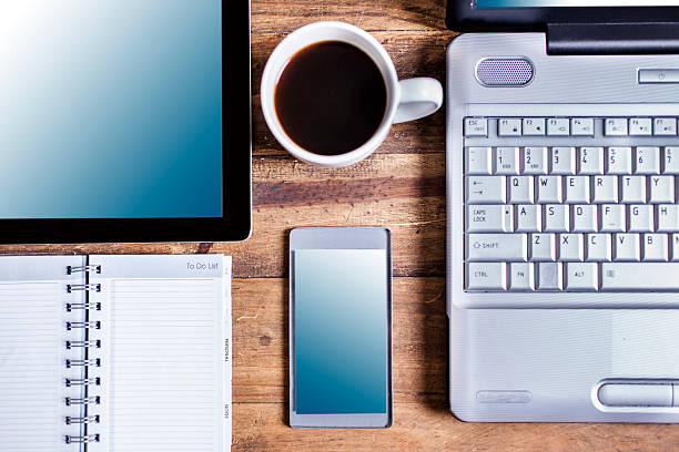 istock Laptop, smart phone, digital tablet technology on desk. 592673754