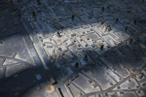 istock Ancient metal map for tourists. 592675066