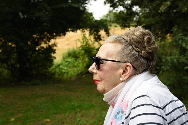 istock Senior woman in thoughtful pose 592678982