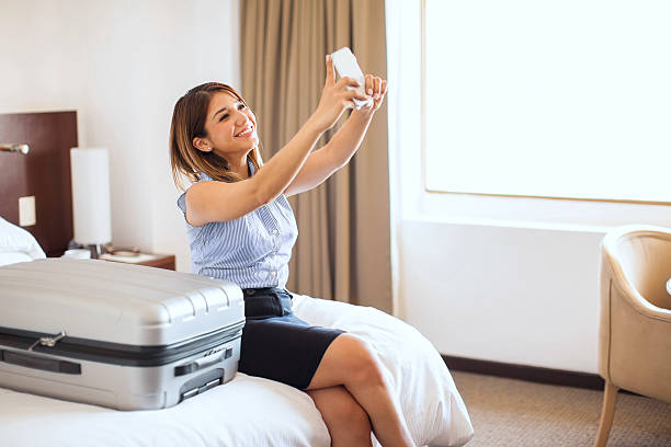 istock Taking selfie of her first business trip 592681714