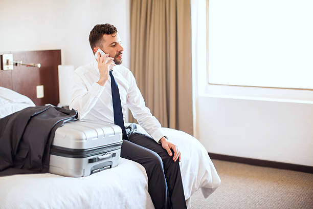 istock Making a few calls before leaving the hotel 592681872