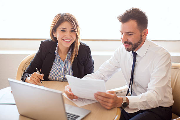 istock Sales executives working together in a hotel 592682024