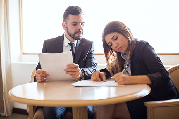 istock Businessman and client closing a deal 592682194