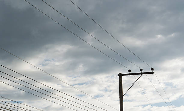 istock Electric pole connect to the high voltage electric wires 592683268