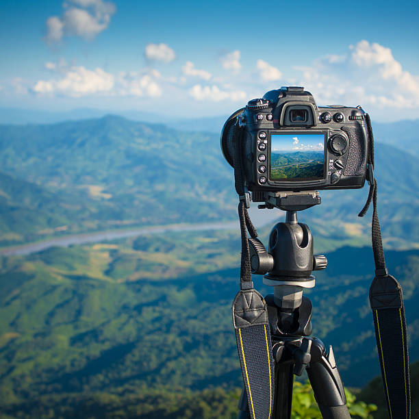 istock Beautiful sunshine at misty morning mountains . 592685540