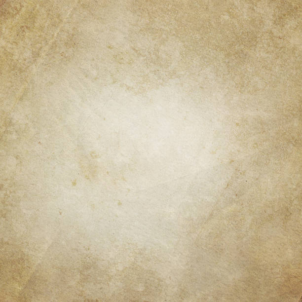istock Old dirty and yellowed paper texture. 592687348