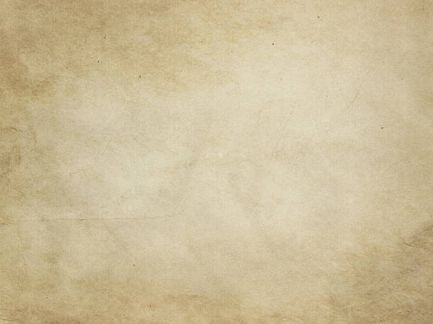 istock Old dirty and yellowed paper texture. 592687964