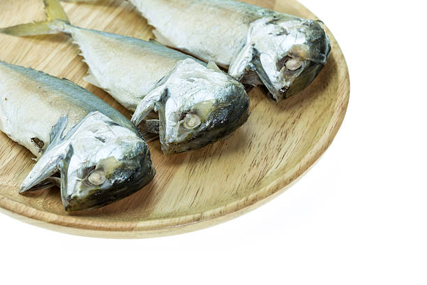 istock Thai mackerel on wooden dish isolated on white background 593294808