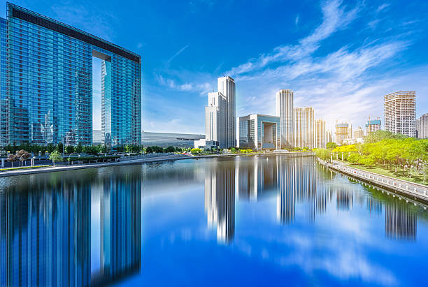 istock Modern buildings and river in urban city 593295914