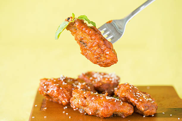 istock Grilled Chicken Wings with Red Spicy Sauce 593297304