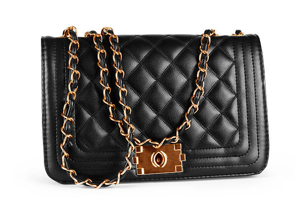 istock Elegant black female bag over white background 593298630