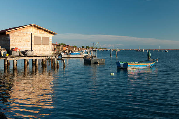 istock Fishing huts at Scardovari lagoon 593299724