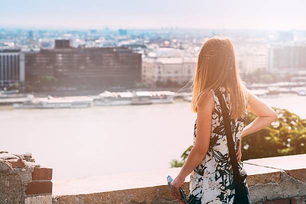 istock Young woman looking on city - Budapest 593302038
