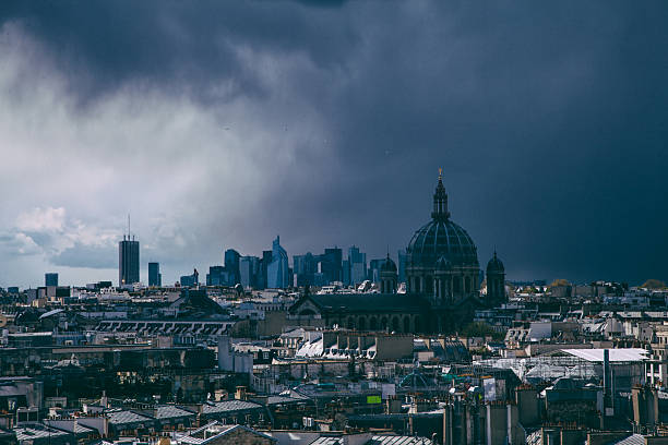 istock Stormy day with dark clouds in Paris city 593302164