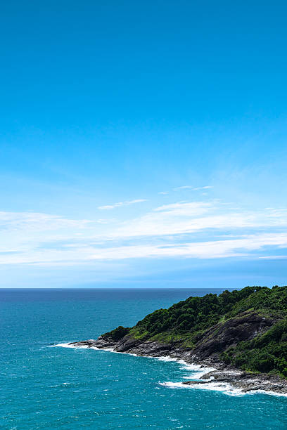 Blue sea and Mountain with sky background stock photo