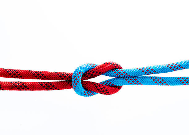 istock Rope with reef knot isolated on white background 593305094