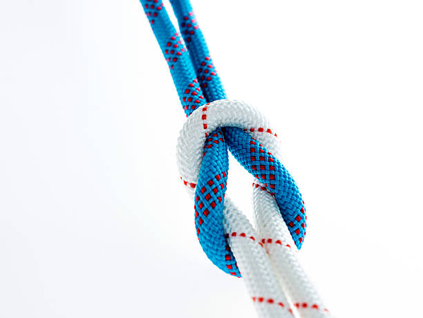 istock Rope with reef knot isolated on white background 593305558