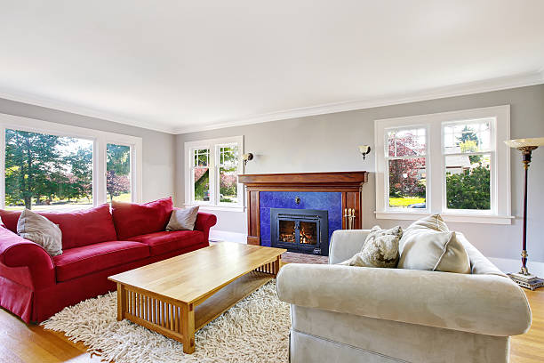 istock Cozy living room interior with red and beige sofas 593305676