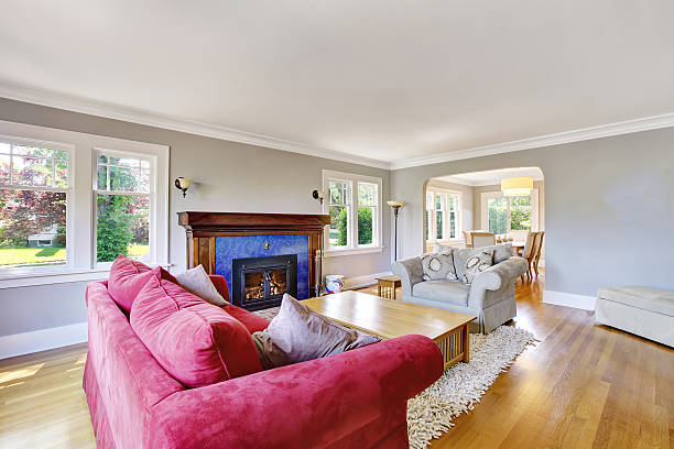 istock Cozy living room interior with red and beige sofas 593305726