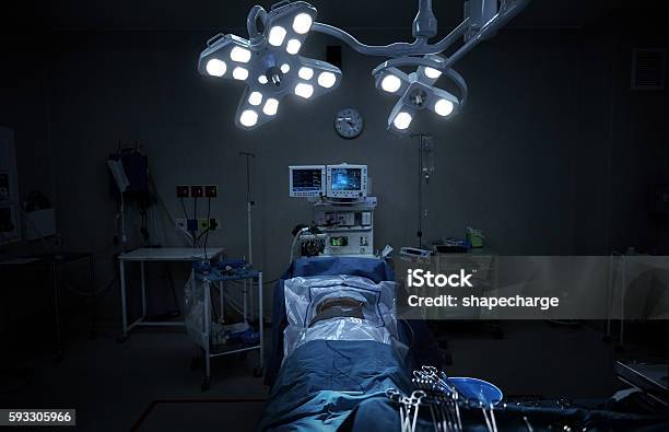 Every Second Counts Here Stock Photo - Download Image Now - Operating Room, Surgery, Dark