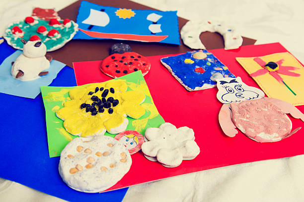 istock baby crafts from play dough and paper, early eduction 593307198