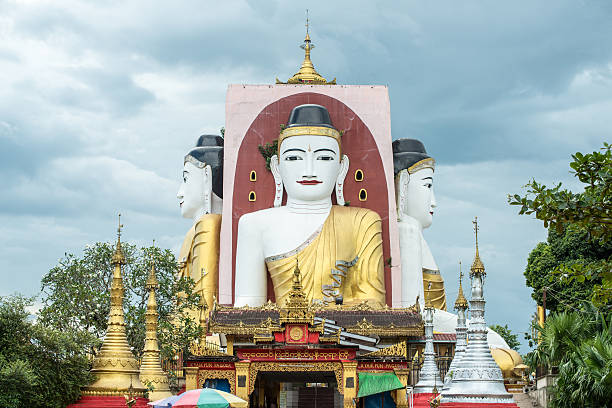 istock Kyaik-Pun Buddha statue of Bago, Myanmar. 593307310