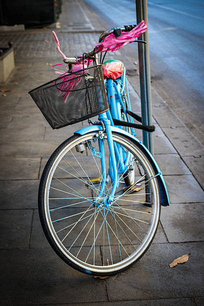 istock Objects: Blue bike on the sidewalk 593309054