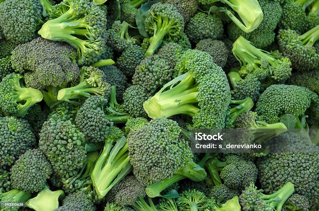Broccoli in a pile Broccoli in a pile on a market Broccoli Stock Photo