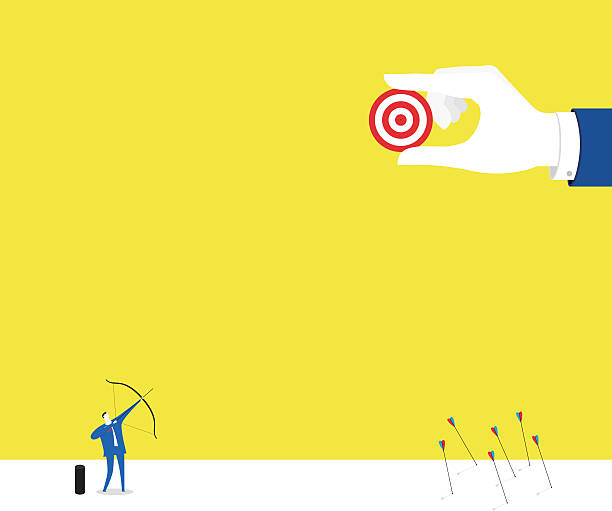 Focus! Focus! / A business man is shooting the last arrow. linchpin stock illustrations