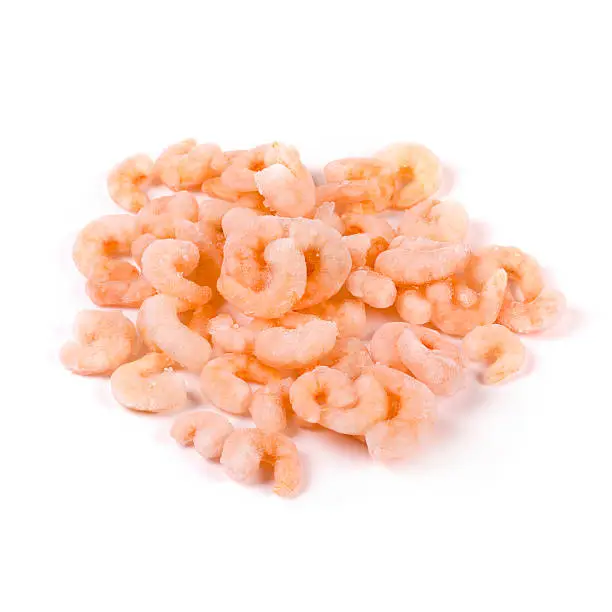 Photo of frozen shrimps isolated on white background