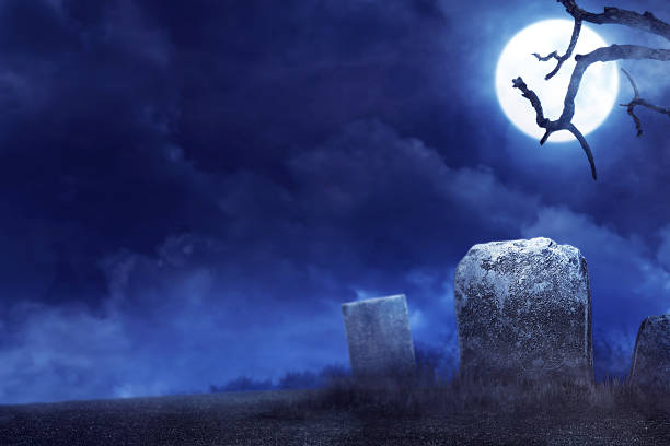 istock Creepy atmosphere in the cemetery in the night 593315428