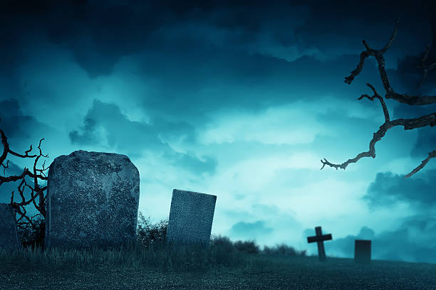 istock Creepy atmosphere in the cemetery with tombstone 593316228