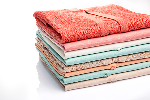 colorful folded clothes (isolated with clipping path over white background)