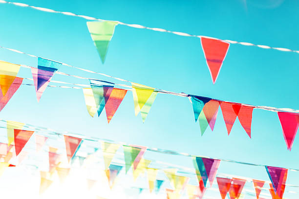 istock Bunting Flags on the blue sky background 593317460