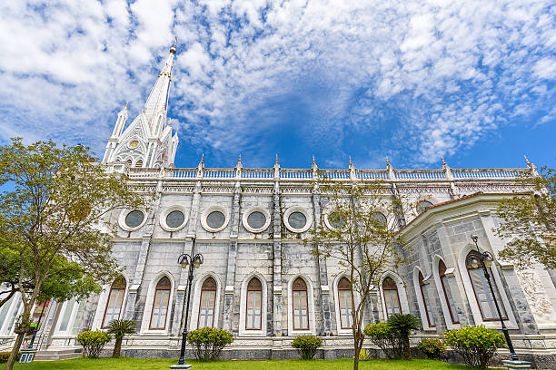 istock Christianity church with blue sky. Thailand. 593319456