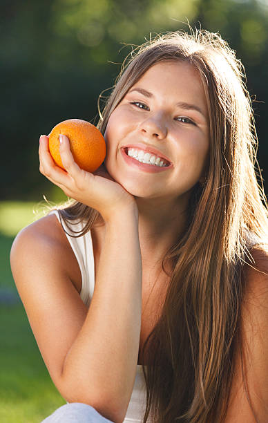 istock Beautiful young girl with open smile 593322330
