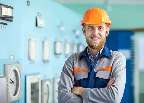 istock Portrait of young happy engineer at control room 593323222