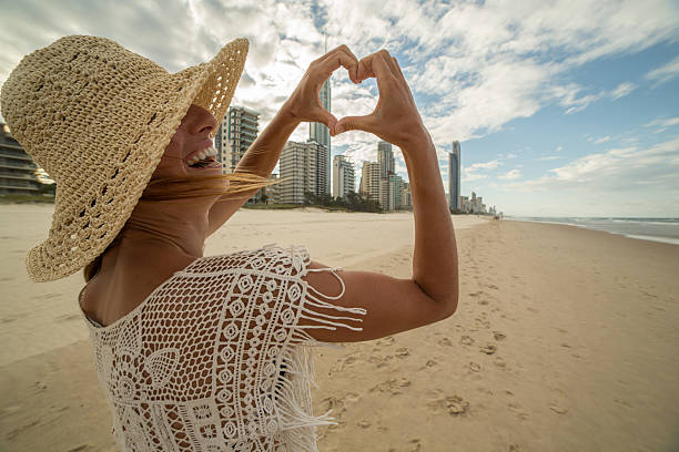 istock Woman loving Surfer's paradise, Australia 593324196