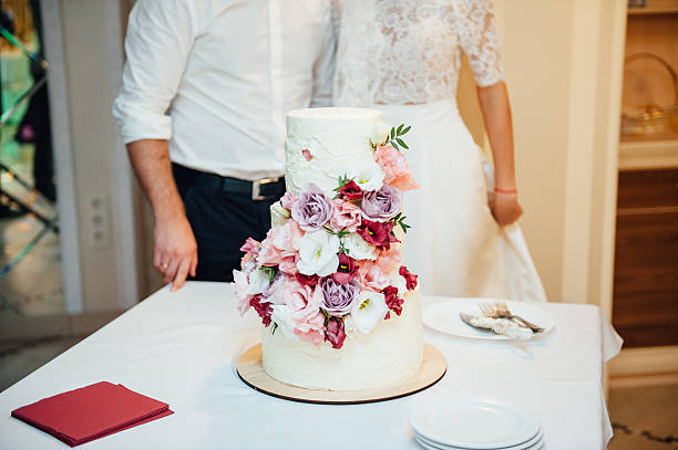 istock Beautiful delicious white wedding cake 593324322