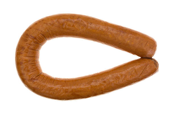istock Reduced calorie kielbasa sausage on a white background 593326218