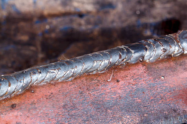 istock welding seam onto steel sheet metal 593328122