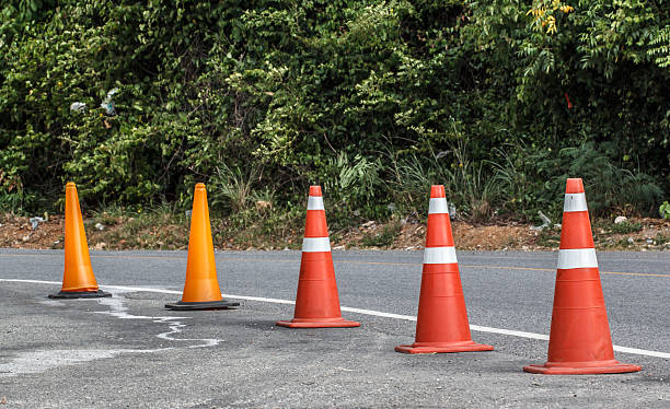 istock Traffic cone in the road 593329158