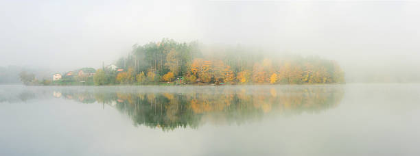 istock Foogy island on the lake 593329292