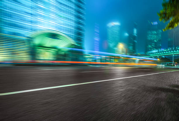 istock car driving on road in city 593332476