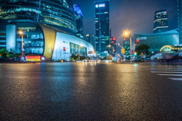 istock car driving on road in city 593332580