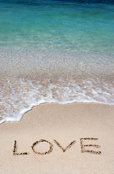istock Romantic beach getaway with the word Love 593334596