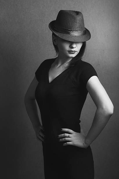 istock Style Noir: Hollywood actress in the hat, 593334606