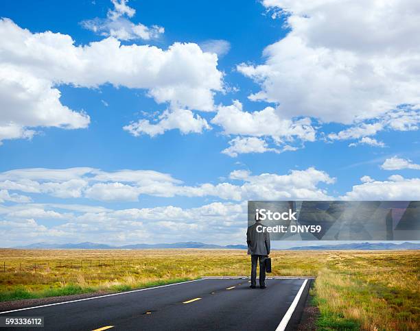 Businessman Standing At End Of The Road Stock Photo - Download Image Now - The End, Road, Looking